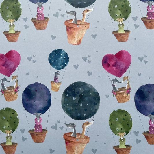 Pattern of colorful hot air balloons with animals in baskets on a light blue background.