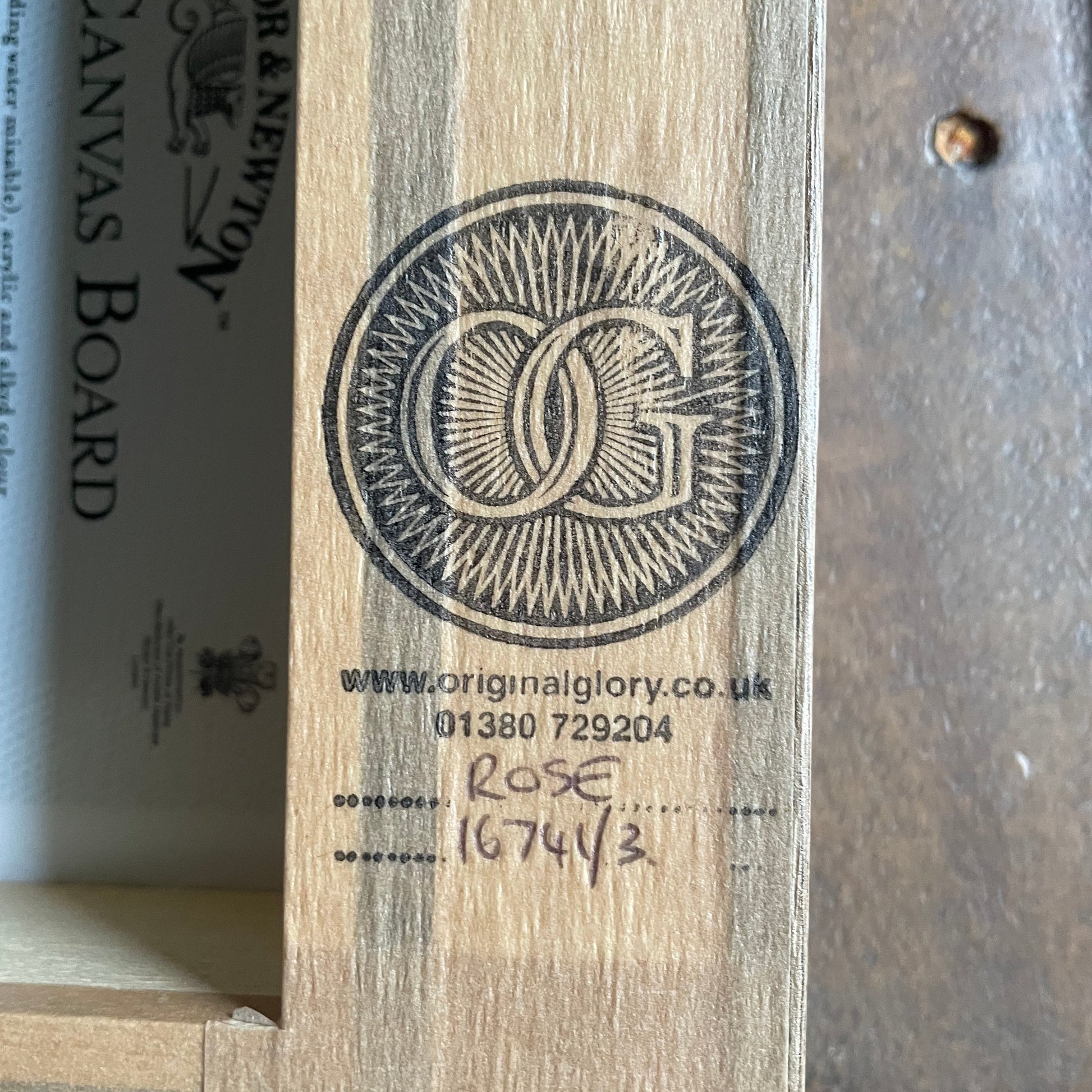 Wooden canvas board with branding and text, featuring Winsor & Newton logo.