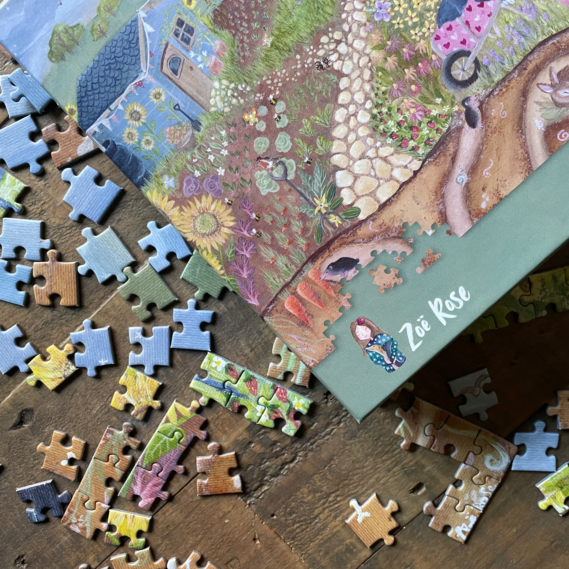 A completed 1000-piece jigsaw puzzle titled 'Up The Allotment' by Zoe rose , displayed diagonally on a rustic wooden surface with scattered puzzle pieces around it.