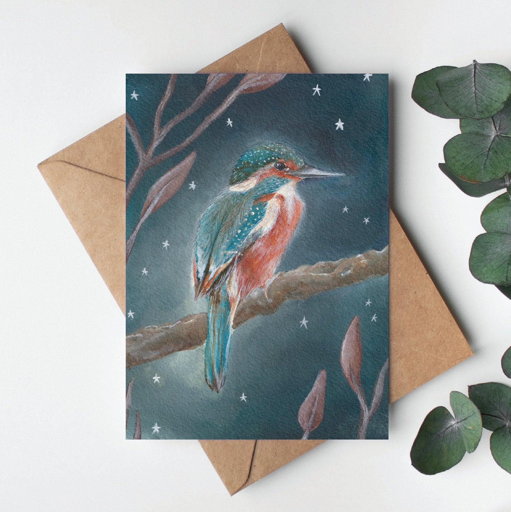 Greeting card with a colorful bird illustration on a white background with leaves.
