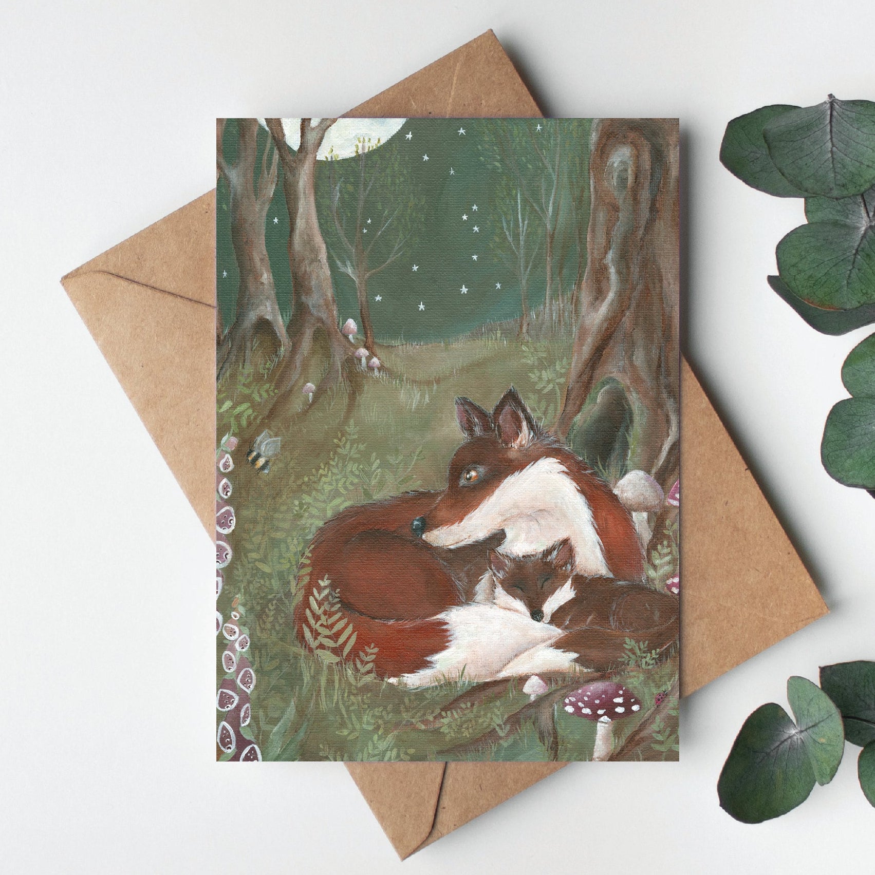 Greeting card with fox illustration on a white background with eucalyptus leaves