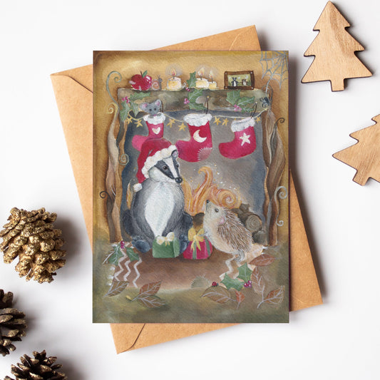 Christmas-themed greeting card with animals and stockings, surrounded by decorative items on a white background.
